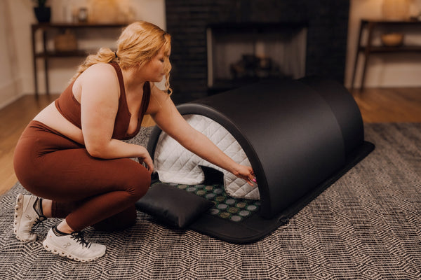 lady using an at home far infrared portable sauna